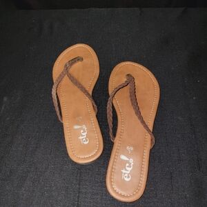 NWOT ladies leather braided strap flip flops from Rue21